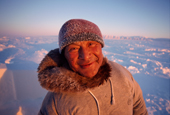 Tukaaq, an Inuit hunter, out on the sea ice in the winter time. Northwest Greenland. 1998