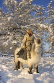 Pavel Sleptsov, a 35 year old hunter, on his horse at Korban in the winter time. Yakutia, Siberia, Russia. 1999