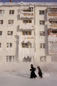 An apartment block coated in ice and frost during the winter in Yakutsk. Yakutia, Siberia, Russia. 2001