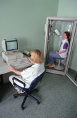 A woman having computer diagnostics of her lung functions at the hospital in Norilsk. W.Siberia, Russia. 2000