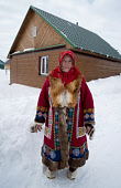 Lyuba Moldanova, an elderly Khanty woman outside her home in the village of Numto. Khanty Mansiysk, Siberia, Russia