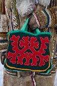 A shopping bag with a traditional Khanty design in red felt on it. Numto, Khanty Mansiysk, Northwest Siberia, Russia