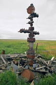 A capped well head & debris left on the tundra in Gazprom's Bovanenkova gas field. Yamal Peninsula, W. Siberia, Russia