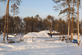 A snow covered 'Poymot', a traditional Selkup turf winter hut, at a winter hunting camp in the forest near Ratta, Krasnoselkup, Yamal, Western Siberia, Russia. (2012)