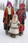 At a Khanty reindeer herder's winter camp, Rima Pyrseva (right) poses with her daughter, Katya and her granddaughter Angelina. Shuryshkarsky Region, Yamal, NW Siberia, Russia